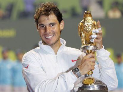 Rafael Nadal with the Qatar Open winner&#039;s trophy. 