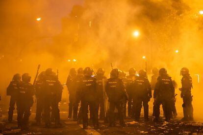 Riot police in Barcelona on Friday night.