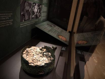 The restored cauldron with more than 8,000 coins at the National Archaeology Museum.