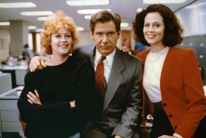 Three stars who need no introduction: Melanie Griffith, Harrison Ford and Sigourney Weaver. They worked together in the movie 'Working Girl.'