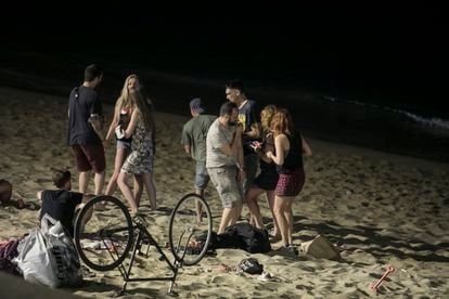 Youngsters gather on Barceloneta beach on July 3. 