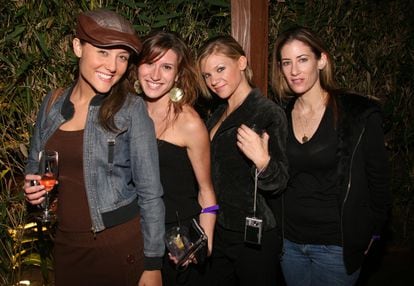 Actresses and presenters Lauren C. Mayhew, Aude Ranoux and Lauren Thomas with Jennifer Saginor (r), at a party in November 2007.