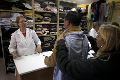 Inside the Red Cross charity shop in the Madrid satellite town of Alcorc&oacute;n.