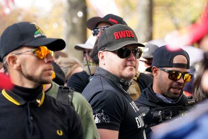 People identifying themselves as members of the Proud Boys join supporters of President Donald Trump for pro-Trump marches, Nov. 14, 2020, in Washington.