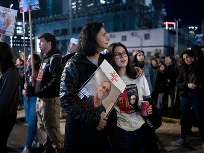Women listen to a speaker during a weekly rally calling for the release of hostages who were kidnapped on Oct. 7, 2023, in Tel Aviv, Israel, Saturday, Feb. 3, 2024