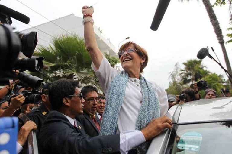 Lima Mayor Susana Villarán salutes her supporters after voting in Sunday's recall ballot called against her.