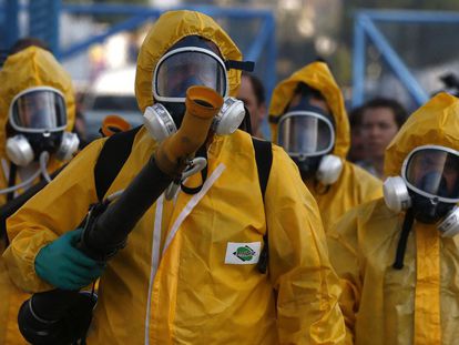 Rio health workers on Tuesday fumigate the Sambódromo, where Carnival celebrations will be held.
