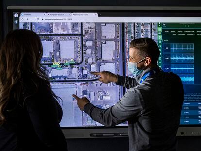 Law enforcement personnel use an interactive electronic map for the ShotSpotter Dispatch program running within the Fusion Watch department at the Las Vegas Metropolitan Police Headquarters Wednesday, Jan. 13, 2021, in Las Vegas.