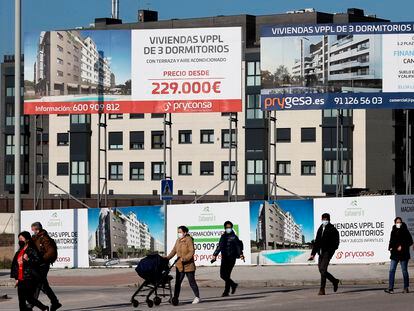 Signs announcing new housing developments in Madrid in October 2021.