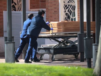 The coffin of a coronavirus victim in La Almudena cemetery in Madrid.