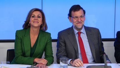 PP secretary general Maria Dolores de Cospedal and Prime Minister Mariano Rajoy.