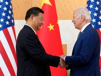 Chinese President Xi Jinping and his U.S. counterpart Joe Biden greet each other on November 14, 2022, during a G-20 summit in Bali.