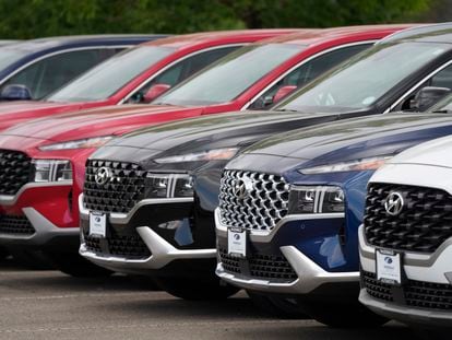 A line of 2022 Santa Fe SUV's sit outside a Hyundai dealership Sunday, Sept. 12, 2021, in Littleton, Colo.