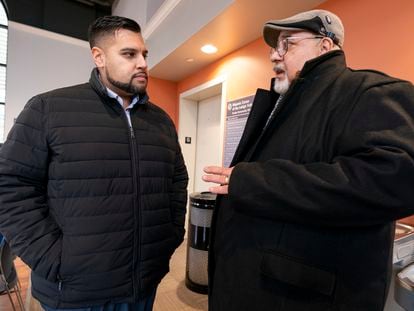 Guillermo Lopez Jr., right, talks with Raymond Santiago, executive director, Hispanic Center Lehigh Valley, left, on Jan. 18, 2024, in Bethlehem, Penn.