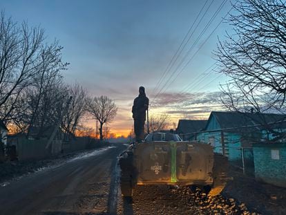 A Ukrainian soldier on a tank guarding an access road about two miles from the Bakhmut front line. 