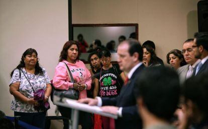 Family members of the kidnapped listen to the city prosecutor.