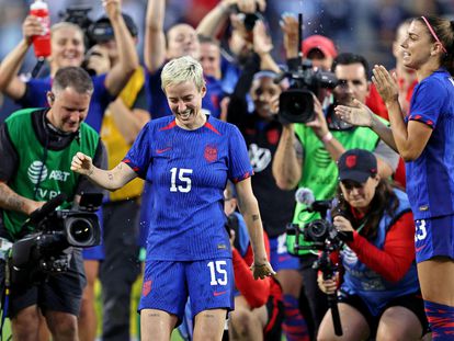 United States forward Megan Rapinoe is splashed with water after the game against South Africa in her last national team appearance at Soldier Field, on Sept. 24, 2023.