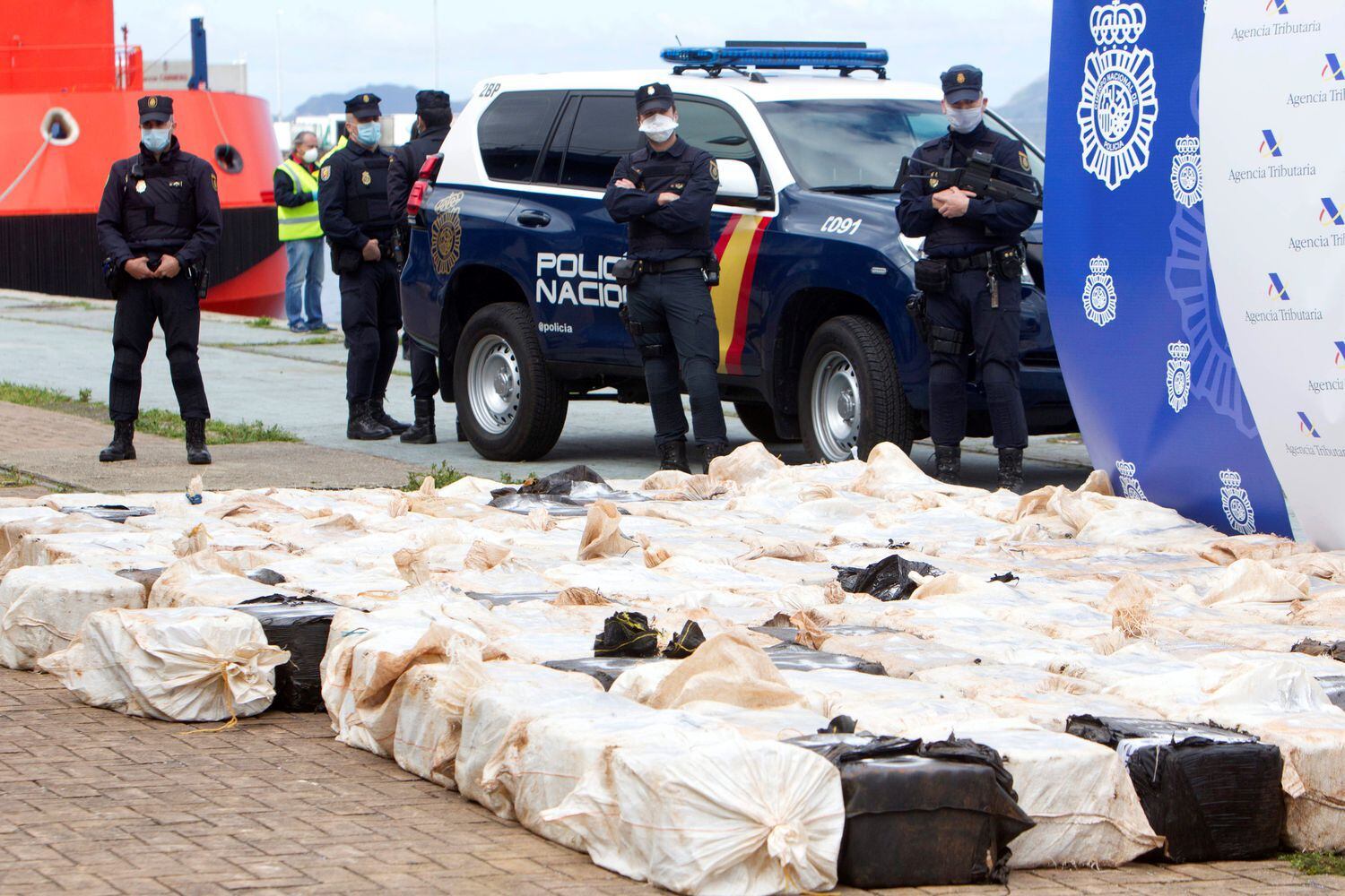 Police with four tons of cocaine seized last April in Vigo, Galicia.