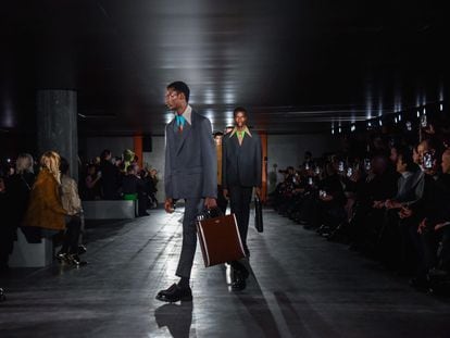 Models wear Prada designs during men's fashion week in Milan, Italy, on January 15, 2023