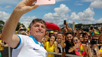 Jair Bolsonaro with supporters at a rally in Brasília on March 15, 2020.