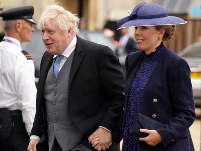Boris Johnson and his wife, Carrie Johnson, on their arrival at the coronation of King Charles III and Camilla, the Queen consort, on May 6 at Westminster Abbey in London.