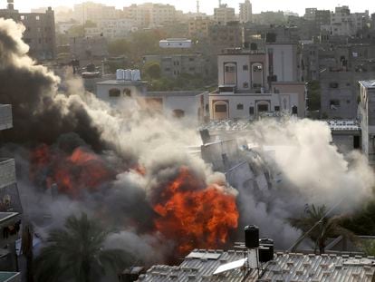 Smoke and fire rise from an explosion caused by an Israeli airstrike targeting a building in Gaza, Saturday, May 13, 2023. The building was owned by an Islamic Jihad official.