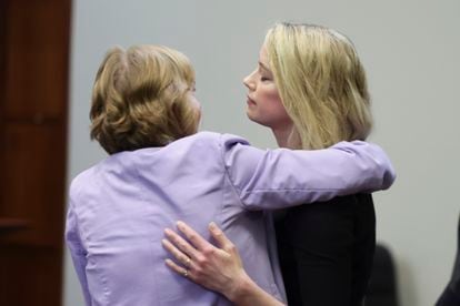 Amber Heard hugs her lawyer Elaine Bredehoft after the verdict.