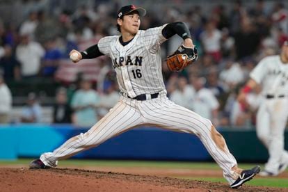 Japan pitcher Shohei Ohtani (16) aims a pitch during the ninth inning of a World Baseball Classic final game against the U.S., Tuesday, March 21, 2023, in Miami. Japan defeated the U.S. 3-2.