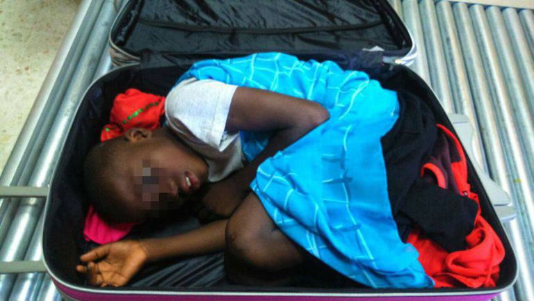 The eight-year-old boy who got across the border in a suitcase.