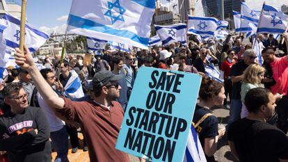A demonstrator holds a placardduring a protest in Tel Aviv, Israel, on Thursday, March 9, 2023.