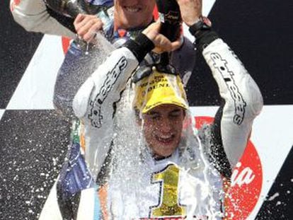 Spain's Marc Marquez celebrates winning the Moto2 World Championship.