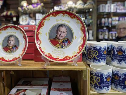 Coronation plates and cups are displayed for sale in a gift shop in London, on April 24, 2023.
