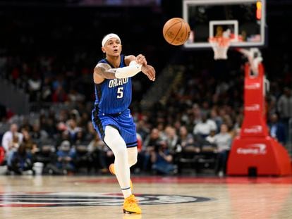 Orlando Magic forward Paolo Banchero (5) plays during the second half of an NBA basketball game against the Washington Wizards, Friday, March 31, 2023, in Washington.