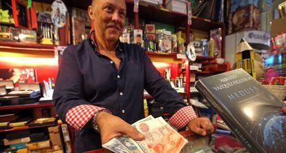 Fernando Losada still accepts pesetas at his Madrid stationery store.