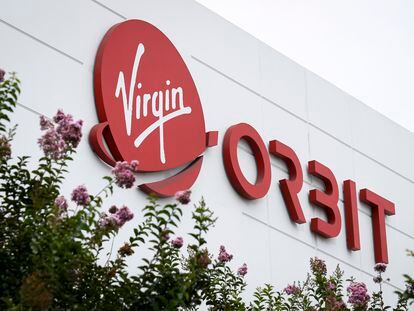 The logo of Virgin Orbit pictured at the company's headquarters in Long Beach, California, in August 2021.