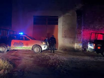Police officers outside the site of a party where an armed group opened fire on partygoers attending a traditional Mexican party, in Salvatierra, Guanajuato, Mexico. December 17, 2023.