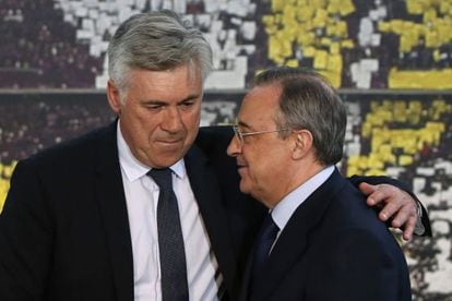 Carlo Ancelotti (left) is congratulated by Real Madrid president Florentino P&eacute;rez at the coach&#039;s presentation on Wednesday.