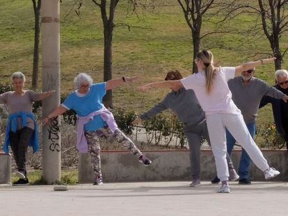 Senior residents exercise in Madrid.