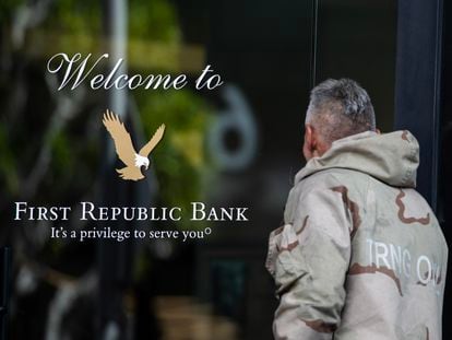 A pedestrian walks by a First Republic Bank ATM in Los Angeles, California, USA, 17 March 2023.