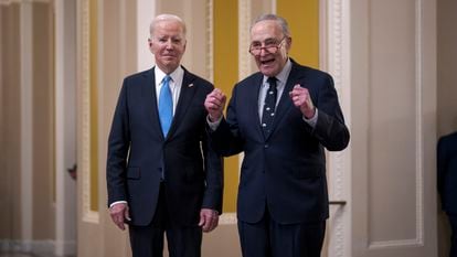 President Joe Biden and Senate Majority Leader Chuck Schumer talk to reporters at the Capitol in Washington, on Thursday, March 2, 2023.