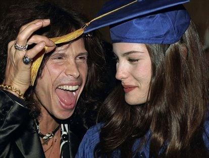 Liv Tyler with her father, Steven, celebrating her high school graduation on May 25, 1995.