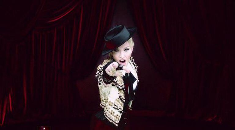Madonna dressed in bullfighting garb.