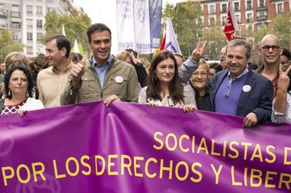 Socialist leader Pedro Sánchez (third from left) marches in Madrid to celebrate the end of the abortion reform.