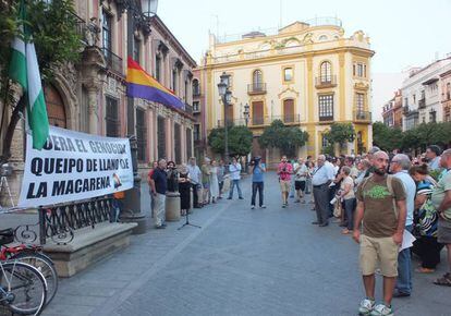 Banner reads “Get the genocidal Queipo de Llano out of La Macarena.”