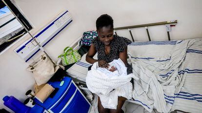 A mother with her newborn baby at a hospital in Kibera, a neighborhood in Nairobi, Kenya.