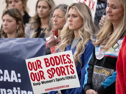 Former University of Kentucky swimmer Riley Gaines, second from right, stands during a rally on Thursday, Jan. 12, 2023, outside of the NCAA Convention in San Antonio.