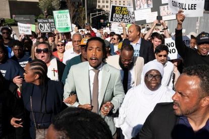State Representative Justin Jones, D-Nashville, center, marches with supporters to the state Capitol, on April 10, 2023, in Nashville, Tennessee.