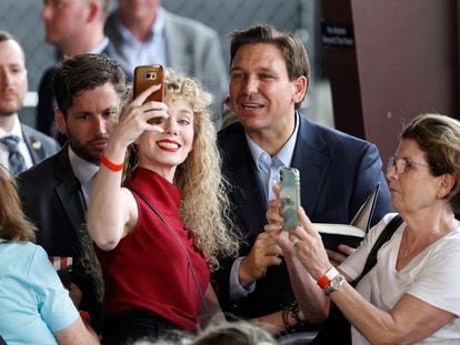 Florida Governor and likely 2024 Republican presidential candidate Ron DeSantis poses for a selfie after speaking as part of his Florida Blueprint tour in Pinellas Park, Florida, U.S. March 8, 2023.