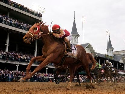 Rich Strike (21), with Sonny Leon aboard, wins the 148th running of the Kentucky Derby horse race at Churchill Downs Saturday, May 7, 2022, in Louisville, Ky.