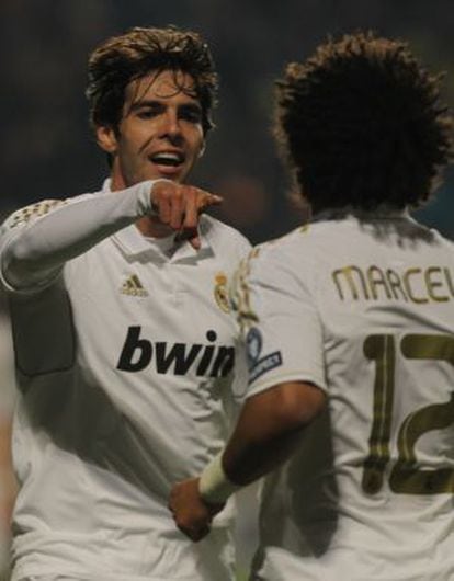 Bench mates: Kaká thanks fellow substitute Marcelo for his assist